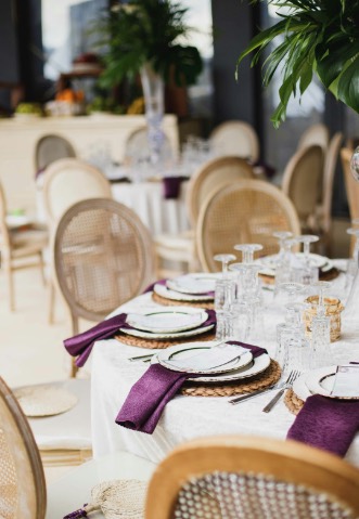 A dining room laid for a large group